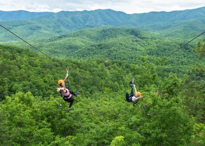girls-mountaintop-zipline two girls on mountaintop zipline tour