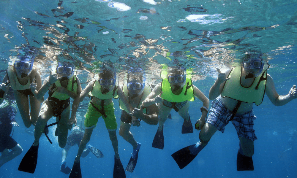 family snorkeling in hawaii